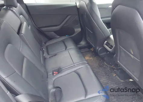 2023 Tesla Model Y Awd/Long Range Dual Motor All-Wheel Drive z USA, uszkodzony, nr VIN 7SAYGAEE7PF610842